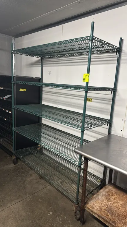 Green epoxy-coated 5-tier mobile wire shelving rack. Features (5) adjustable wire shelves. Dimensions: 60"W x 24"D x 80"H. Mounted on casters.