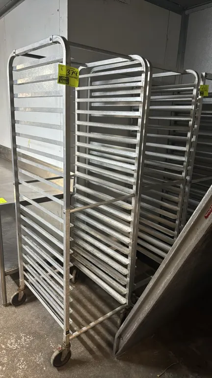 Full-size aluminum speed racks. Features multi-tier angle runners designed for sheet pans. Mounted on swivel casters.