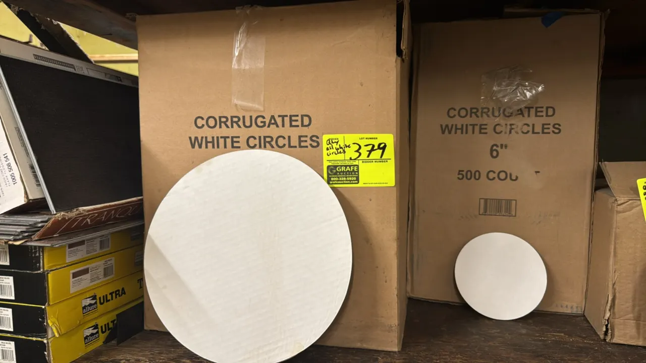 Bulk lot of white corrugated circles. Includes 12", 8", and 6" diameter circle boards. Features white corrugated paperboard construction. Packaged in