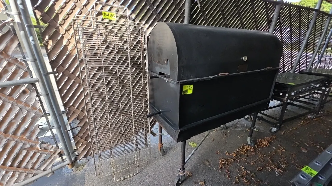 Belson Outdoors Porta-Grill PG-2460-II propane corn roaster and grill. Features 10 rotating baskets, (2) stainless steel grill racks, roll-top hood wi