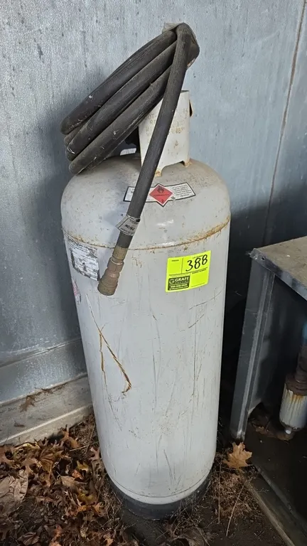 2006 Manchester Tank LP gas propane cylinder. Includes flexible gas hose with quick-connect fitting. 4'H. Specifications: DOT-4BW240, WC 238 lb, TW 68