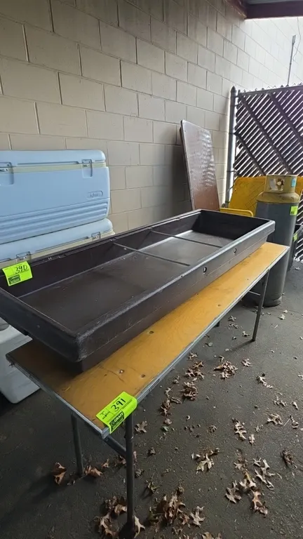 Laminate top folding tables. Features wood-look laminate tops with protective metal edge banding and folding tubular metal legs. Dimensions: 6'L. Cont