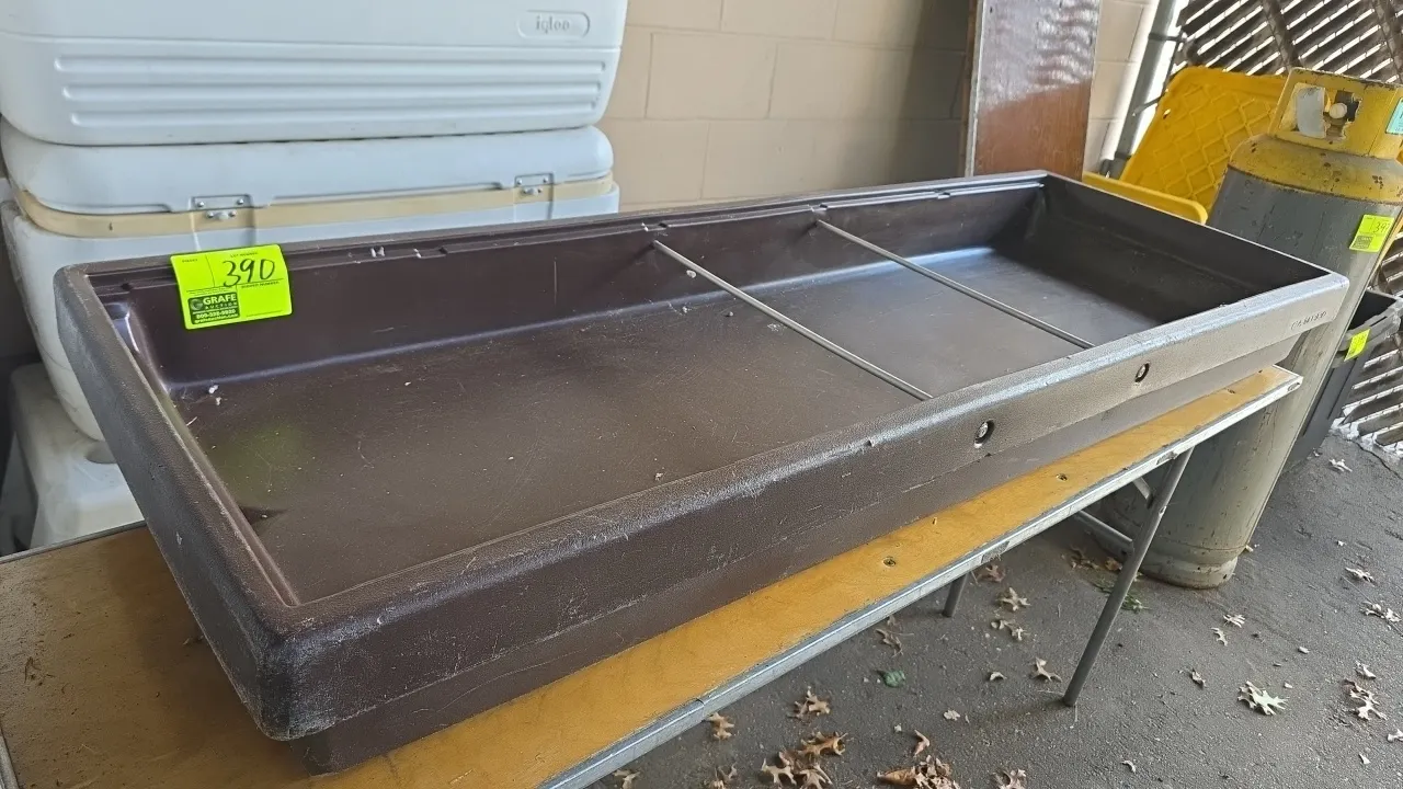 Cambro poly insulated ice bin. Features brown molded polyethylene construction, (2) divider rods, and bottom drain with plug. Dimensions: 6'L x 2'W. F