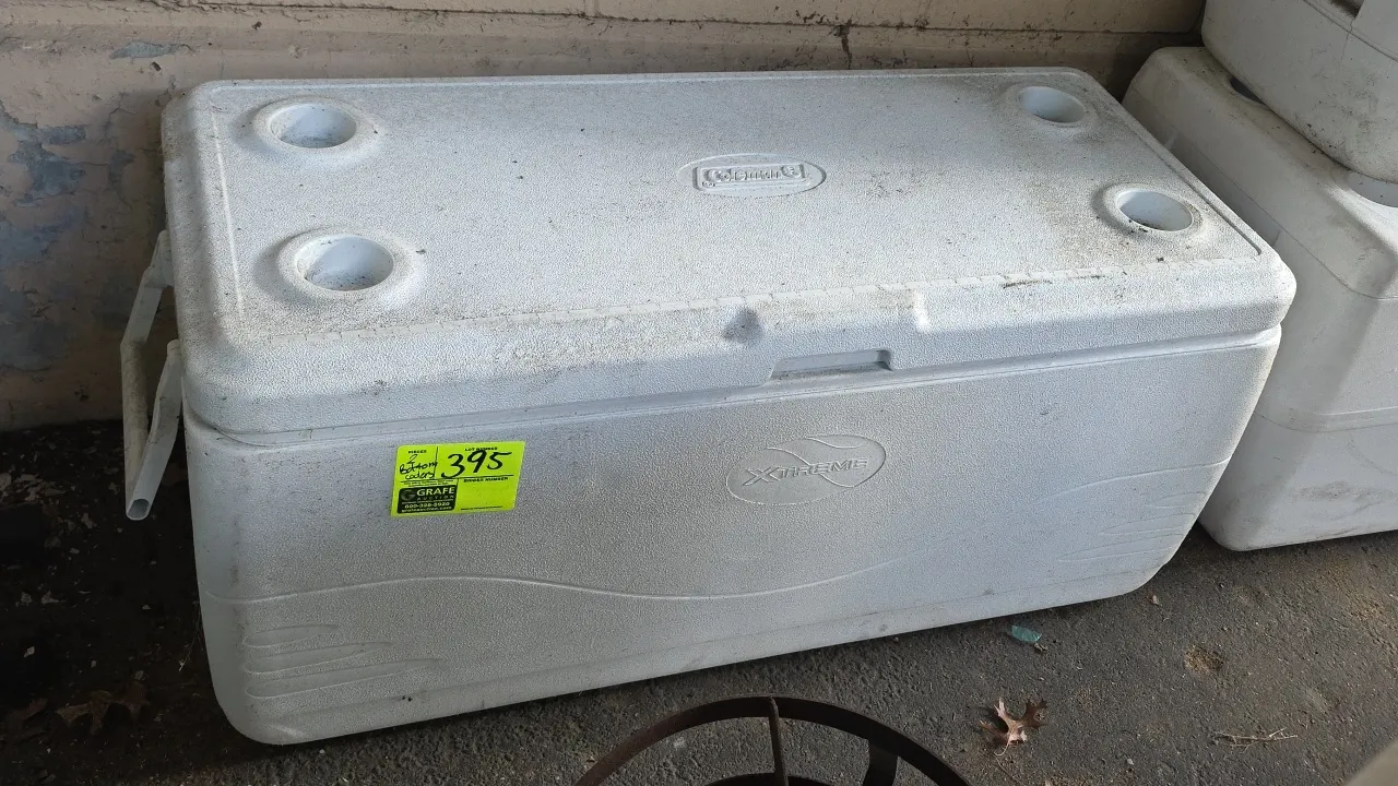 Coleman and Rubbermaid insulated coolers. Includes (1) Coleman Xtreme cooler and (1) Rubbermaid cooler. Features molded lids with 4 cup holders and in