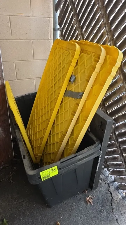 Poly storage bins. Includes (4) yellow lids and a 4-wheel dolly with casters. 45". Note: One lid has tape repair.