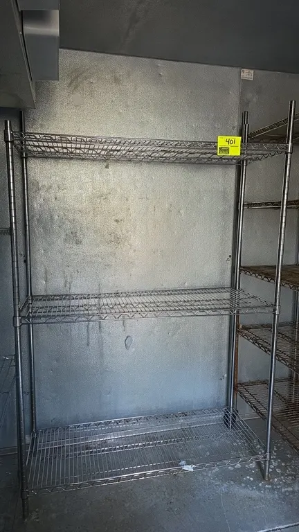 3-tier wire shelving rack. Features chrome-finished metal wire construction with three adjustable shelves. 48" x 18" x 72".