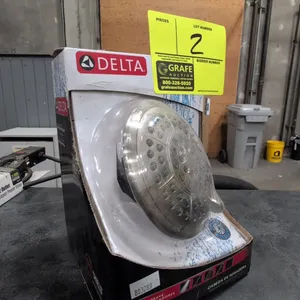 Delta 75554CS showerhead. Features a brushed nickel finish, 5 spray settings, and a maximum flow rate of 1.75 GPM at 80 PSI. WaterSense certified. In 