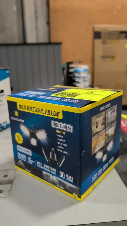 Brightliving multi-directional LED light. Features 6,000 lumens light output, adjustable multi-position panels, and standard screw base. Power: 60W.