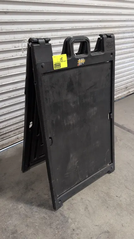 Plasticade Signicade Deluxe poly A-frame sign stand. Features molded black polyethylene construction, double-sided folding design, integrated carry ha