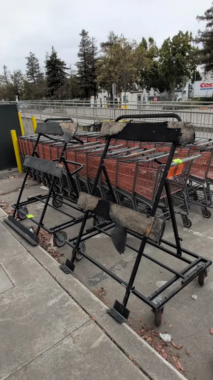 Metal portable flat panel carts. Features steel A-frame construction, bottom support ledges, and carpeted horizontal rests. 4'L. Mounted on casters. N