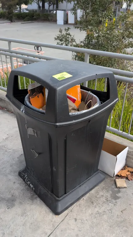 Rubbermaid poly waste bins. Features durable molded polyethylene construction, 4-sided open dome top, and pedestal base. 24" x 40". Contents not inclu