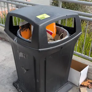 Rubbermaid poly waste bins. Features durable molded polyethylene construction, 4-sided open dome top, and pedestal base. 24" x 40". Contents not inclu