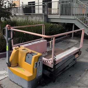 2018 Ballymore PLDE15 portable loading dock scissor lift. Features 1,500 lb rated capacity, safety handrails, tethered push-button pendant control, ti