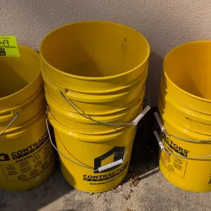 Contractors Warehouse poly buckets. Features yellow plastic construction and wire bail handles with plastic grips. Dimensions: 12" x 14" each. Content
