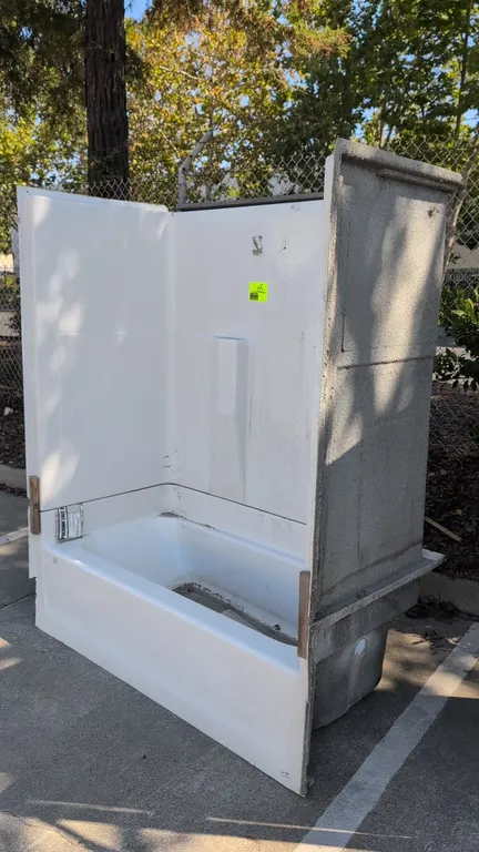 2019 Aquatic 26032PR-WH one-piece tub and shower stall. Features right-hand drain, integrated molded wall shelves, and white acrylic finish. Dimension