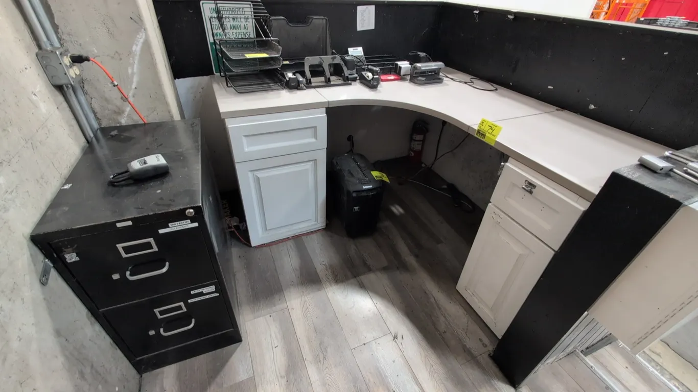 Laminate curved corner desk with two under-desk storage cabinets and a 2-drawer metal filing cabinet. Desk dimensions: 64" x 61". Filing cabinet dimen