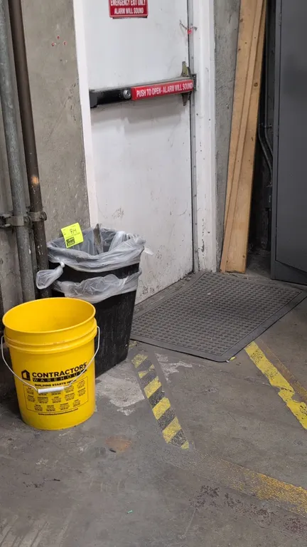Assorted facility maintenance supplies. Includes poly waste bin, Contractors' Warehouse poly bucket with wire bail handle, and a 36"x24" bubble-surfac