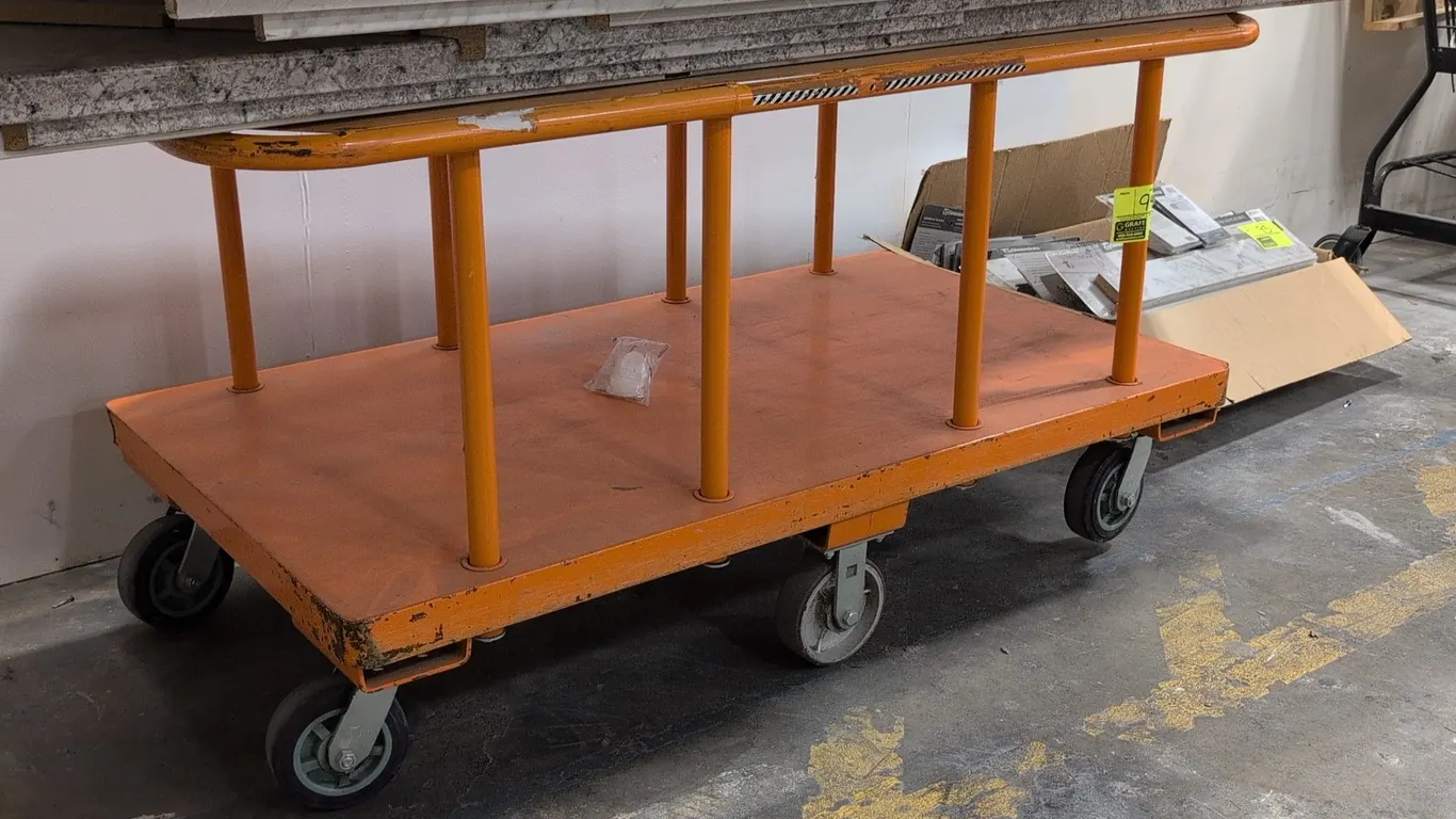 Metal 2-tier platform cart. Features tubular steel frame supports and orange finish. 60" x 30". Mounted on 6 casters. Contents not included.
