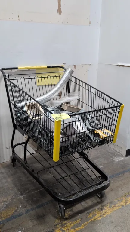 Assorted electrical supplies with metal shopping cart. Includes electrical junction boxes, plaster mud rings, flexible duct, ceiling fan box, switch c