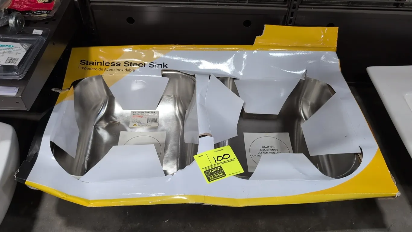 RTD331974 stainless steel double bowl sink. Features 21-gauge stainless steel construction with a satin finish. Dimensions: 33" x 19" x 6.5"D.