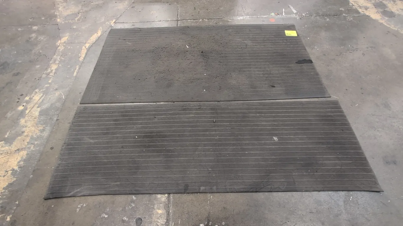Anti-fatigue floor mats. Features ribbed black cushioned surface and beveled perimeter edges. Includes (1) 75" x 36" mat and (1) 75" x 24" mat.