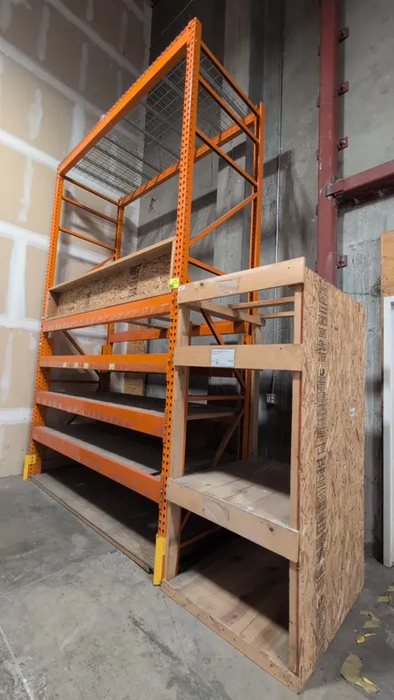 8'L of HMH metal teardrop pallet racking. Features 5-1/2" crossbars, wood and wire decks, and 42"W x 168"H uprights. Includes a 37" x 43" x 82" 3-tier
