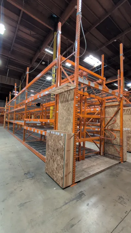 HMH teardrop pallet racking. Includes (8) 12' sections and (2) 8' sections. Features 5-1/2" crossbars, wire decking, and wood decking. Uprights measur