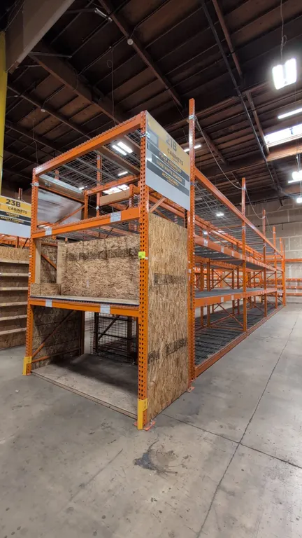 HMH metal teardrop pallet racking. Includes (8) 12' sections and (2) 8' sections. Features 5-1/2" crossbars, wire decking, and wood decking. Uprights