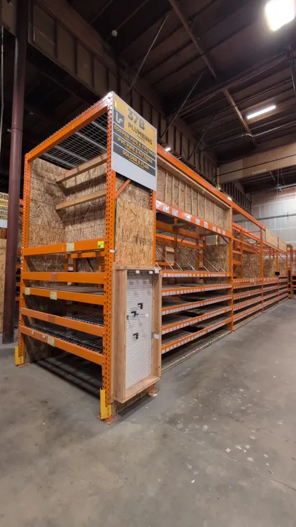 HMH metal teardrop pallet racking. Includes (8) 12'L sections and (2) 7-1/2'L sections. Features 5-1/2" crossbars, wood and wire decking, vertical pip