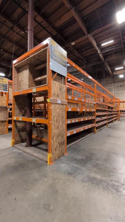 (8) 12' and (2) 7-1/2' sections of HMH metal teardrop pallet racking. Features 4" to 5-1/2" crossbars, wood decking, wire decking, and shelf dividers.
