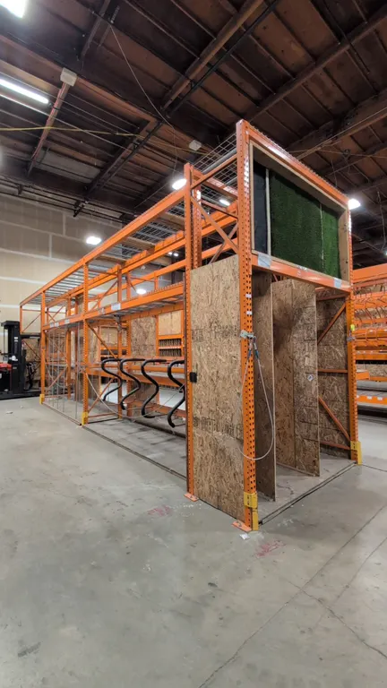 HMH teardrop pallet racking. Configured as (6) 12' sections and (1) 7.5' section. Features 4" to 5.5" crossbars, wood decking, and wire mesh decking.