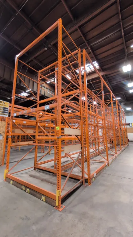 8' sections of HMH metal teardrop pallet racking. Features 4" to 5-1/2" crossbars, wood and wire decking, and wire divider bars. Upright dimensions: 5