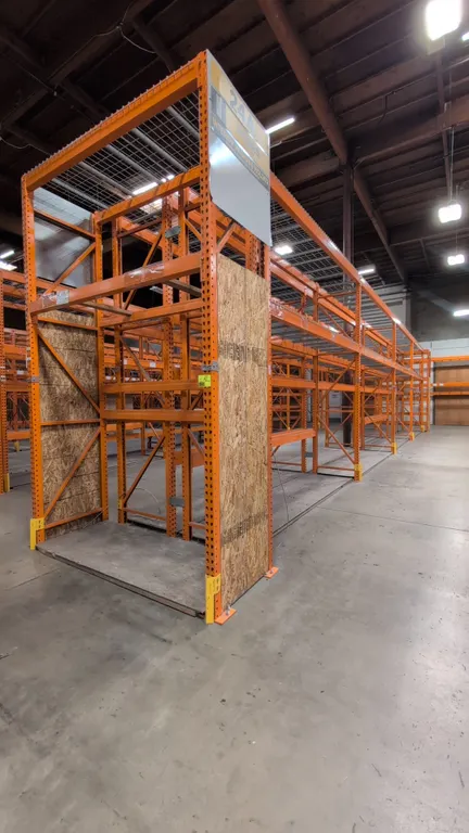 HMH metal teardrop pallet racking comprising (8) 12' and (2) 7-1/2' sections. Features 4" to 6" crossbars, wire mesh decks, and wood decking. Dimensio
