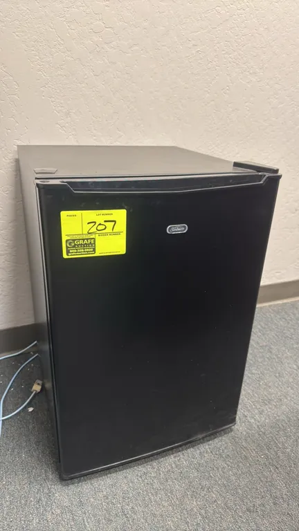 Sunbeam SGR25MBKE compact refrigerator. Features 2.5 cu. ft. capacity, single door, upper chiller compartment with drip tray, two glass shelves, and i