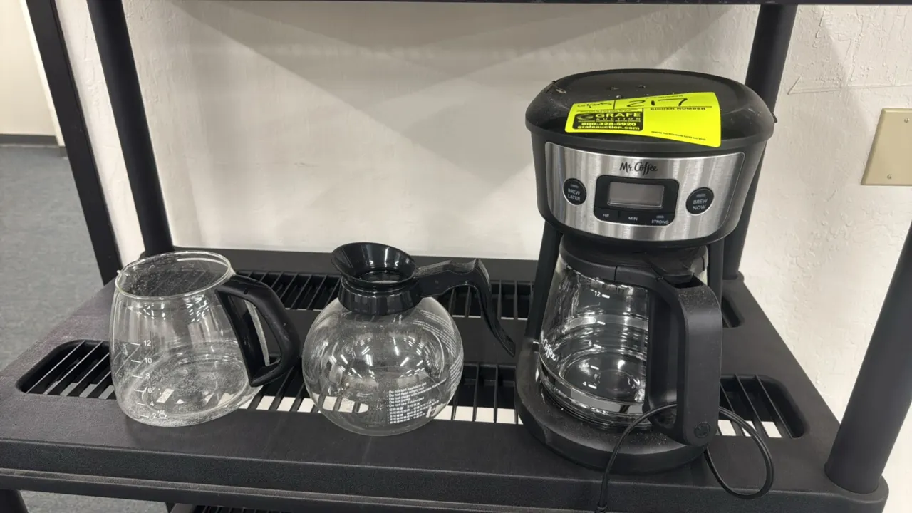 Mr. Coffee 12-cup programmable drip coffee brewer. Features digital display, Brew Later and Brew Now functions, and Strong brew selector. Includes pri
