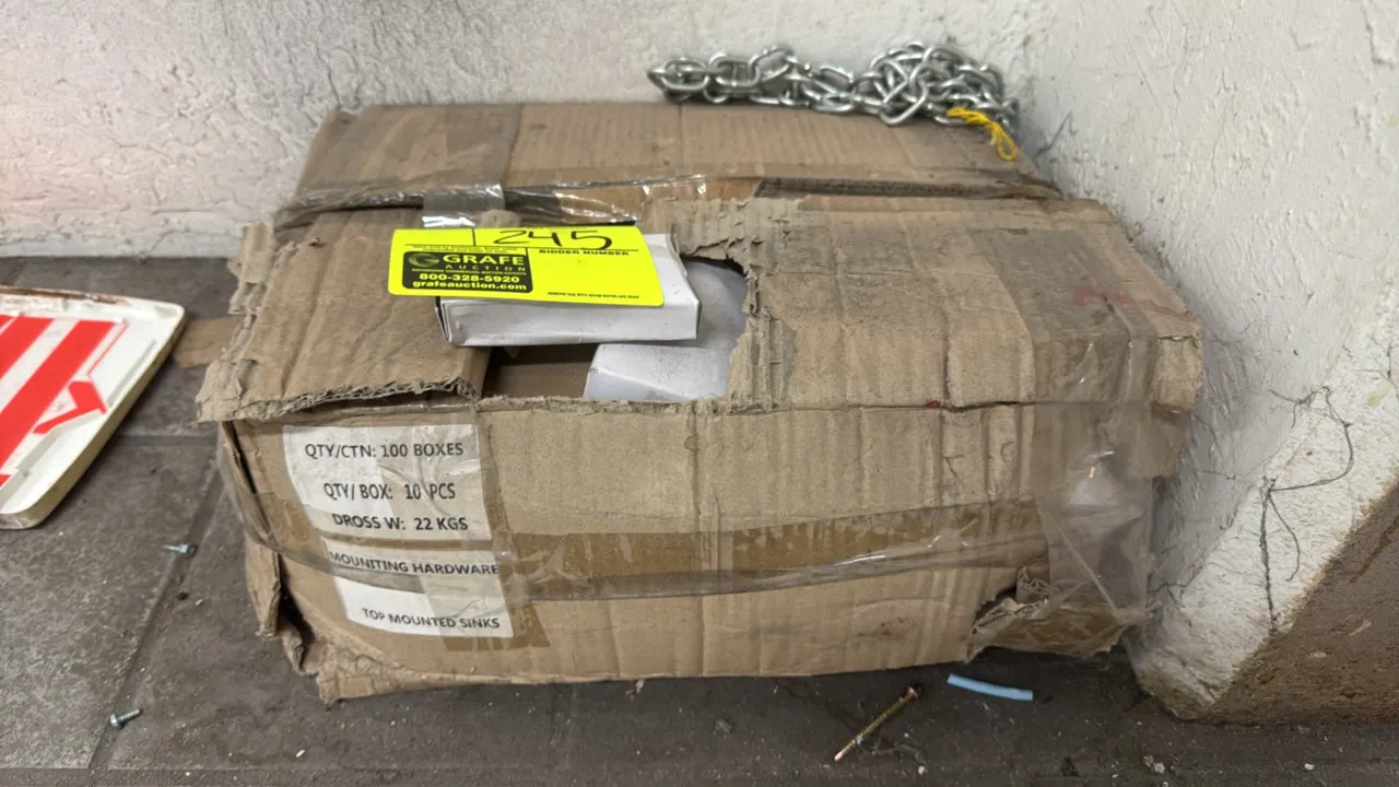 Top-mounted sink mounting hardware. Master carton marked for up to 100 individual boxes containing 10 pieces per box. Note: Outer packaging is torn an
