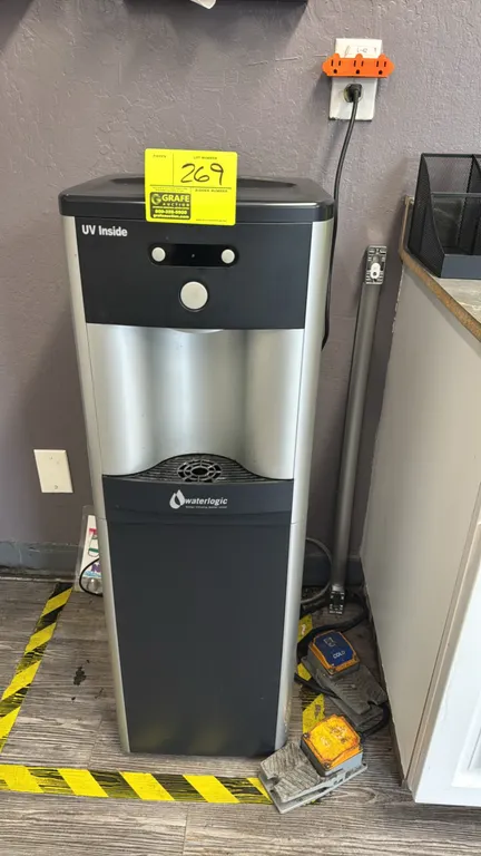 Waterlogic 12-CHCU3 freestanding water dispenser. Features hot and cold water dispensing, UV purification technology, front push-button controls, remo