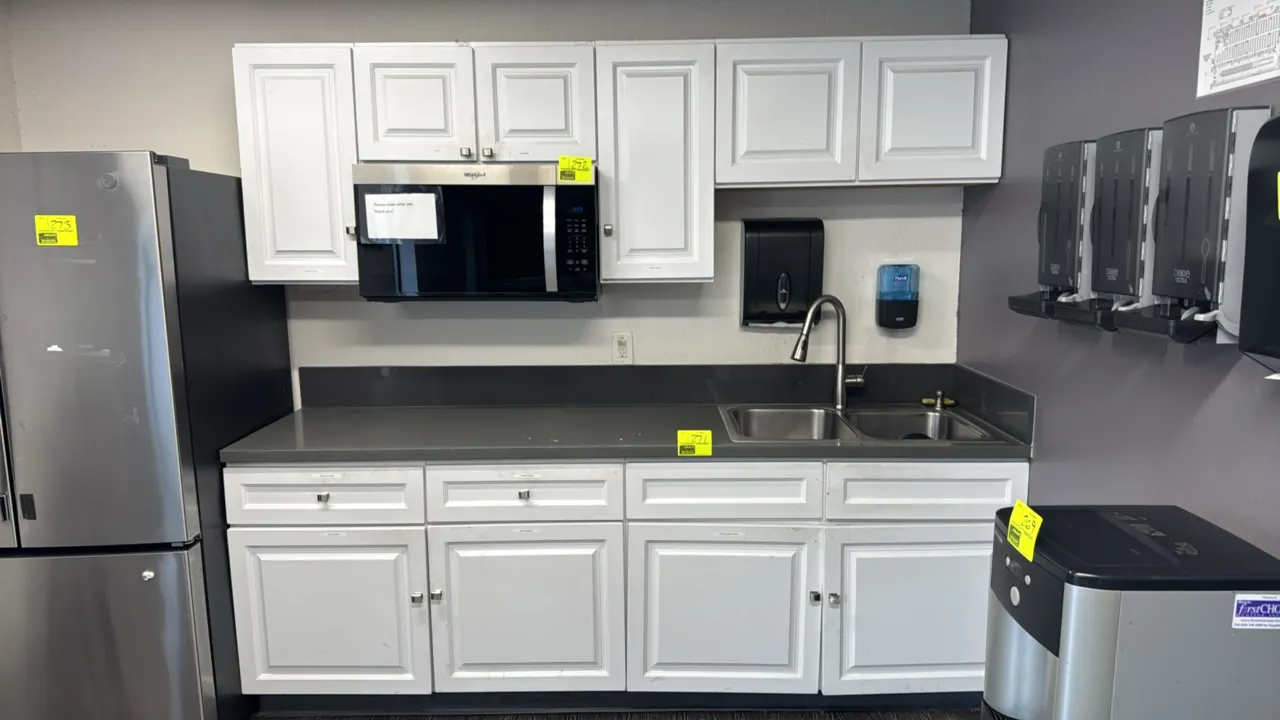Laminate breakroom cabinet set. Includes 96"x25" base cabinets with drawers and lower storage, solid surface countertop with backsplash, stainless ste