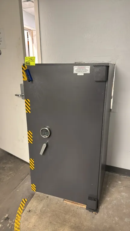 2017 SecuRam depository drop safe. Features SecuRam ProLogic electronic combination locks, through-the-wall drop access, upper storage shelf, (2) slid