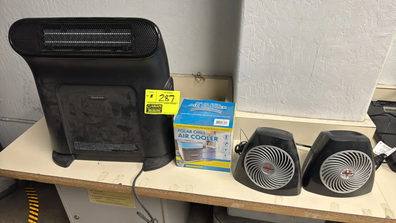 Assorted portable space heaters and personal air cooler. Includes (1) Honeywell electric heater, (1) boxed Polar Chill personal air cooler, and (2) Vo