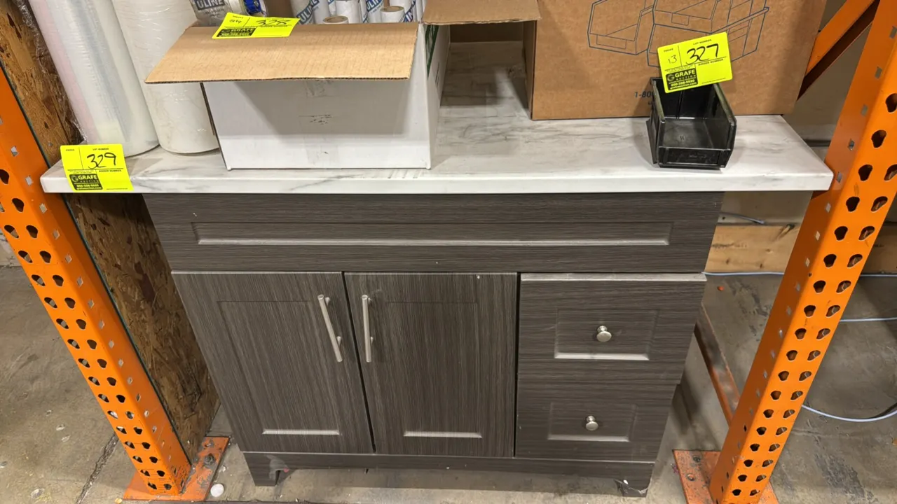 Laminate countertop base cabinet. Features marble-look laminate counter, gray woodgrain finish, 2 cabinet doors, and 2 drawers with metal hardware. 48