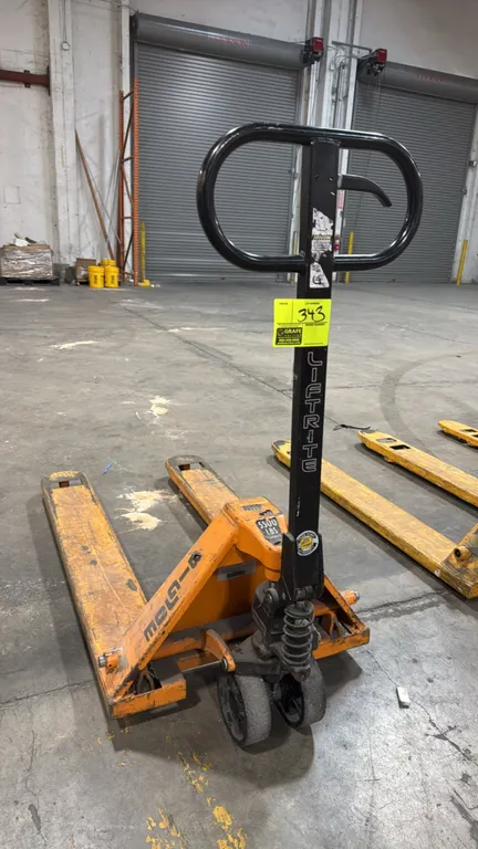Big Joe hydraulic manual pallet jack. Features a 5,500 lb load capacity, Lift-Rite pump handle with fingertip release lever, dual steer wheels, and po