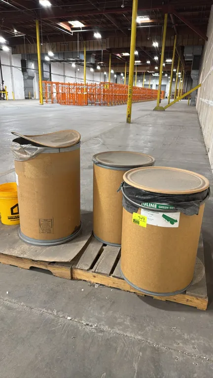 Uline sweeping compound fiber drums. Includes Green Sweep (model S-11668) and No Grit (model S-12888) sweeping compounds. Packaged in fiberboard drums