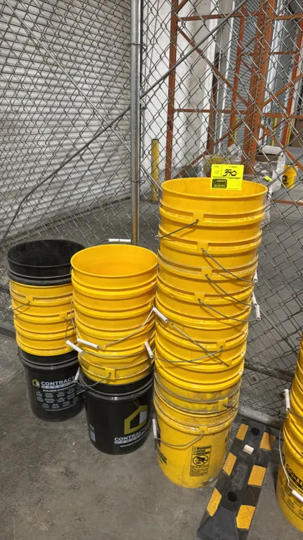 5-gallon poly buckets. Features durable molded plastic construction with metal wire bail handles and plastic hand grips. Yellow and black finish.
