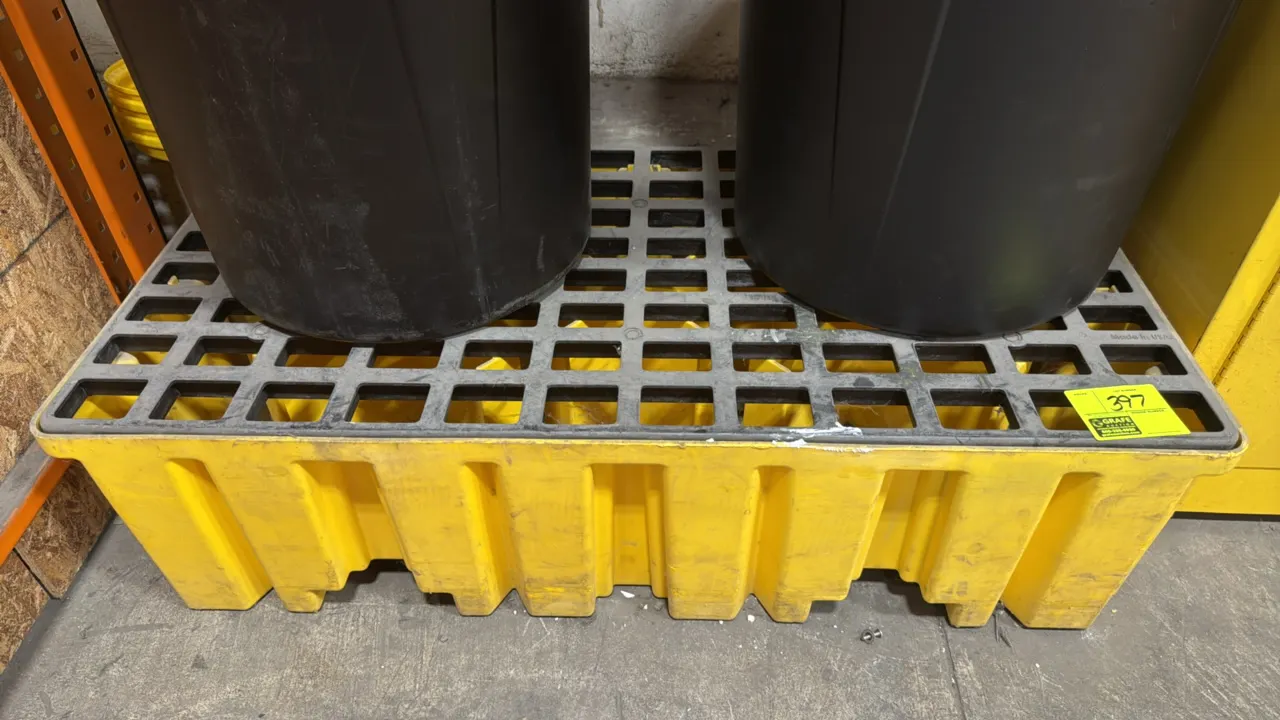 Eagle spill containment pallet. Features durable polyethylene construction with removable black grate. 52"L x 26"W x 14"H. Barrels not included.
