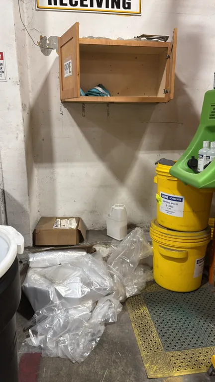 Spill response supply package. Includes (2) Uline S-18303 20-gallon universal spill kit poly drums, an assortment of clear poly containment bags, and