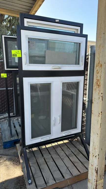 Solar Ind. Series 5000 vinyl window sample display stand. Includes casement and awning sample windows featuring LoE clear glass with argon fill, scree