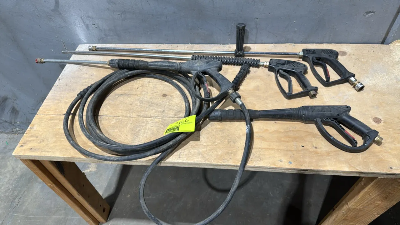Pressure washer spray guns and accessories. Includes (4) spray guns, extension wands, and (1) coiled high-pressure hose. Features a Giant 21290C spray