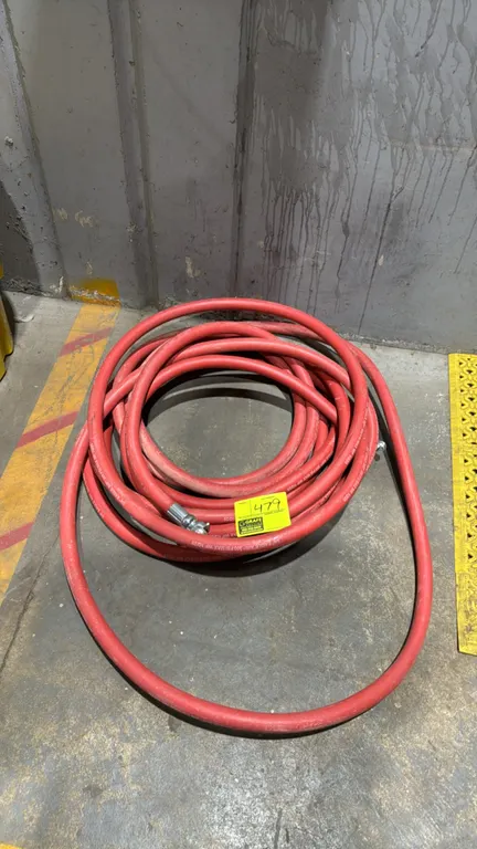 Eagle Air 3/4" rubber air hose. Features red rubber jacket and universal claw coupling fittings. Max working pressure: 300 PSI.