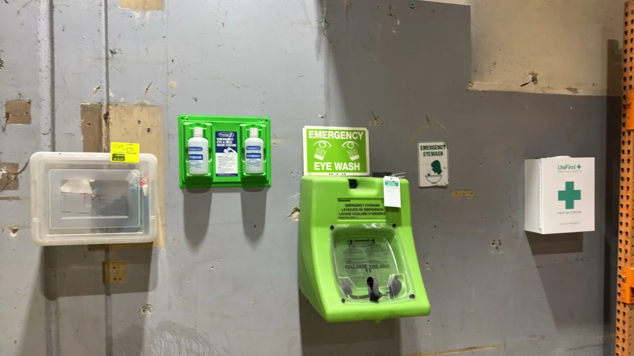 Emergency safety station lot. Includes Honeywell wall-mounted gravity-flow eyewash station, Physicians Care dual-bottle eye and face wash station, Uni